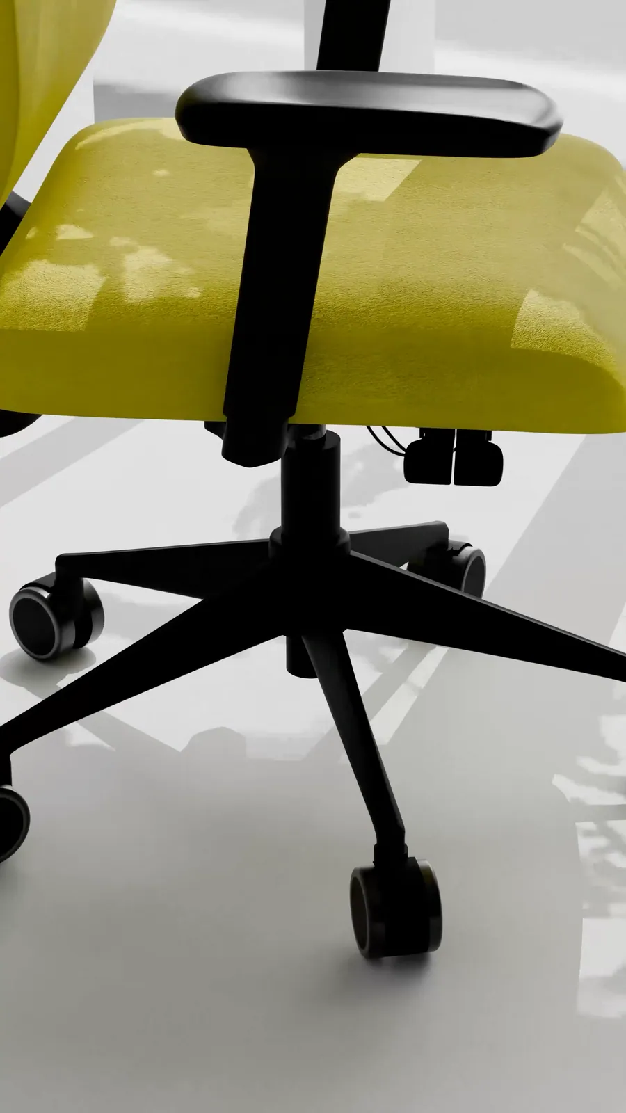 Close-up of the lime chair's armrest, seat and five-star base with castors