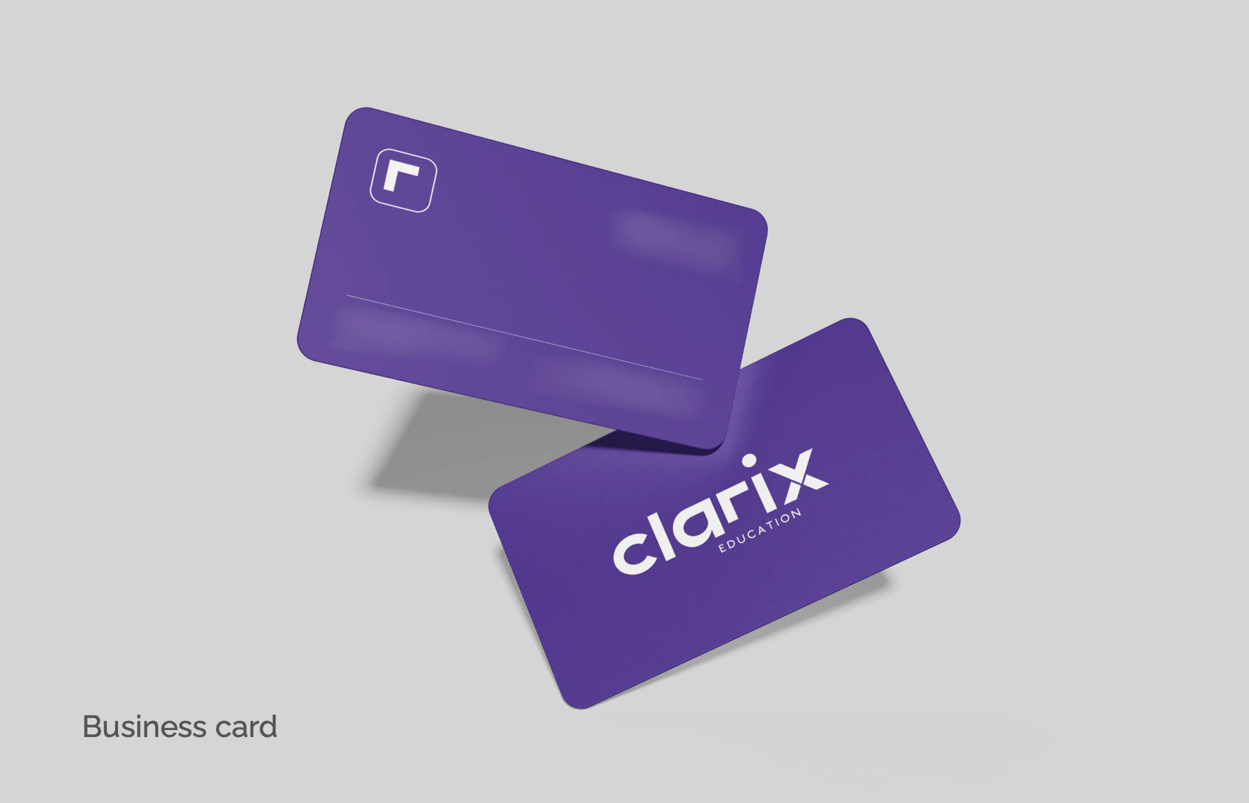 Mockup: double-sided business cards, with the icon and contact face and a wordmark reverse.