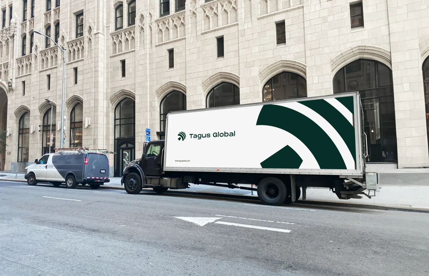 Box-truck livery mockup: the mark's rising bands scaled into a super-graphic across the body.