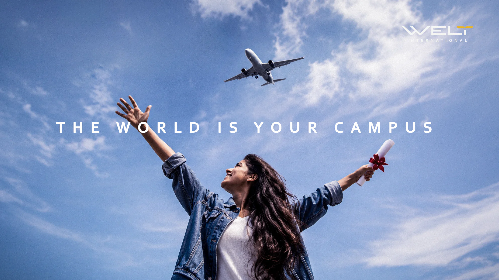"The world is your campus": the proposed key visual, with open sky, a degree in hand and a plane overhead.
