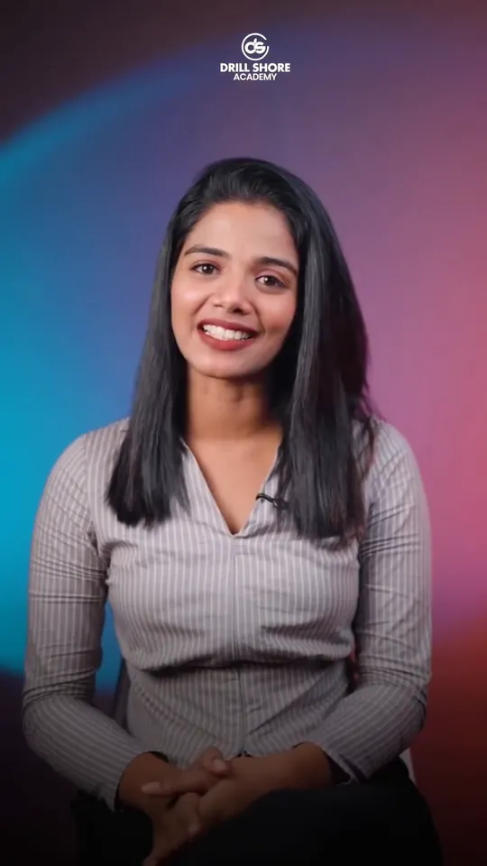 A presenter in a grey striped blouse, smiling with her hands together, against a purple and teal backdrop, in a reel we made for Drillshore Academy