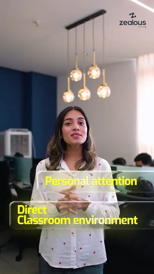 Presenter in a white shirt under pendant lights, with the words Personal attention and Direct classroom environment, in a Zealous Learning reel